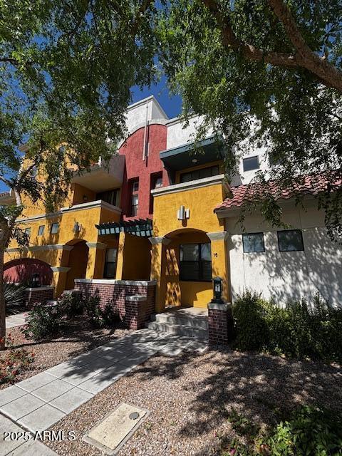 view of front of house featuring stucco siding