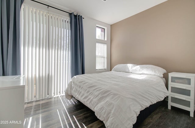 bedroom featuring wood finished floors