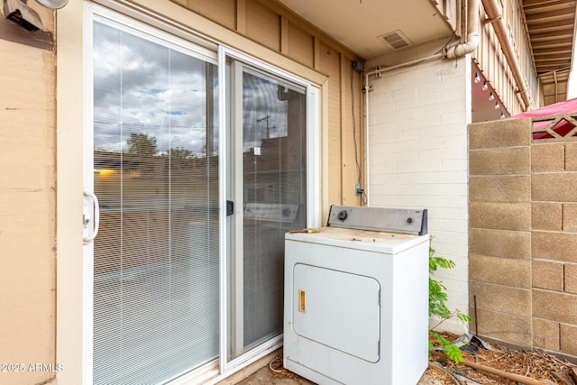 laundry area with washer / dryer and laundry area