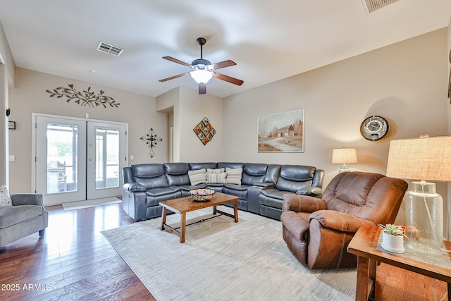 21968 W Hadley St, Buckeye, AZ 85326 - living room featuring french doors, a ceiling fan, and wood finished floors