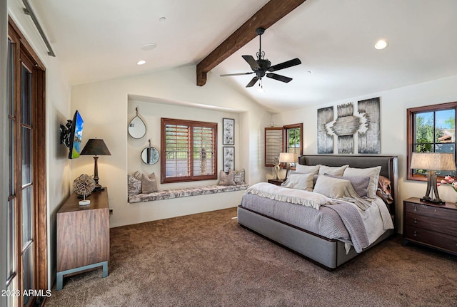 bedroom with ceiling fan, lofted ceiling with beams, and dark colored carpet