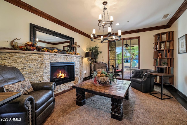 living room featuring a notable chandelier, ornamental molding, carpet floors, and a fireplace