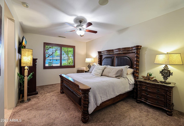 bedroom featuring ceiling fan and light colored carpet