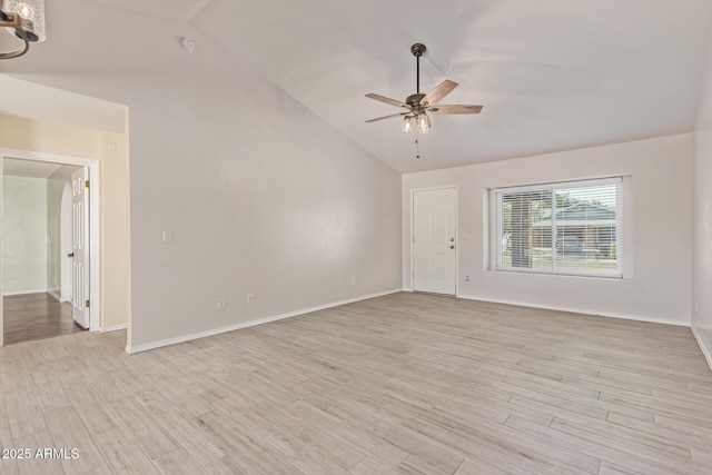 4845 W Evans Dr, Glendale, AZ 85306 - empty room with vaulted ceiling, a ceiling fan, and light wood finished floors