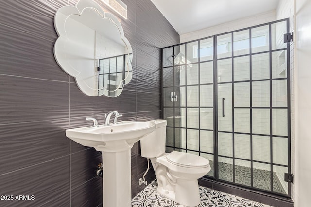 4845 W Evans Dr, Glendale, AZ 85306 - bathroom featuring a stall shower, tile patterned floors, and tile walls