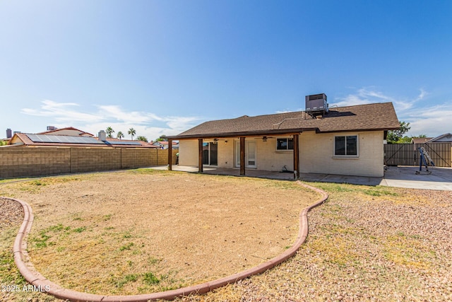 4845 W Evans Dr, Glendale, AZ 85306 - back of house with a patio, a fenced backyard, ceiling fan, a chimney, and a shingled roof