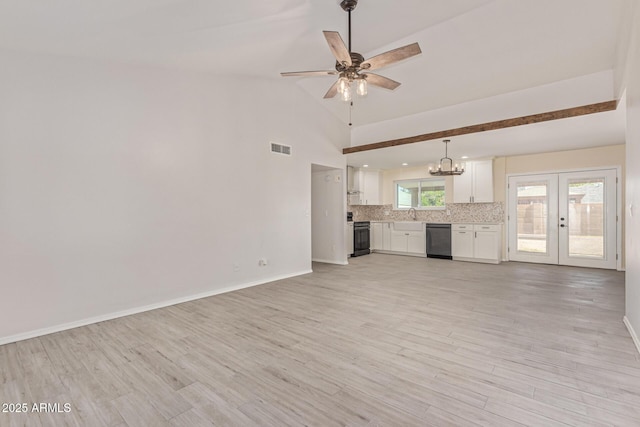 4845 W Evans Dr, Glendale, AZ 85306 - unfurnished living room with french doors, light wood-type flooring, ceiling fan, and a chandelier
