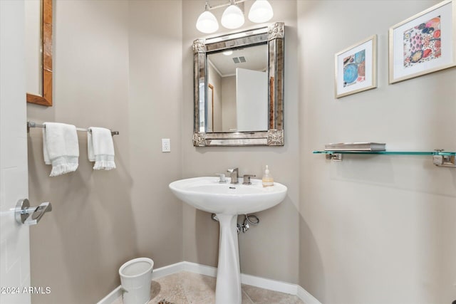 bathroom with tile patterned flooring