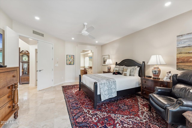 bedroom with ceiling fan and ensuite bathroom