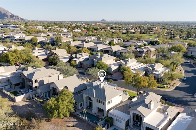 drone / aerial view featuring a mountain view