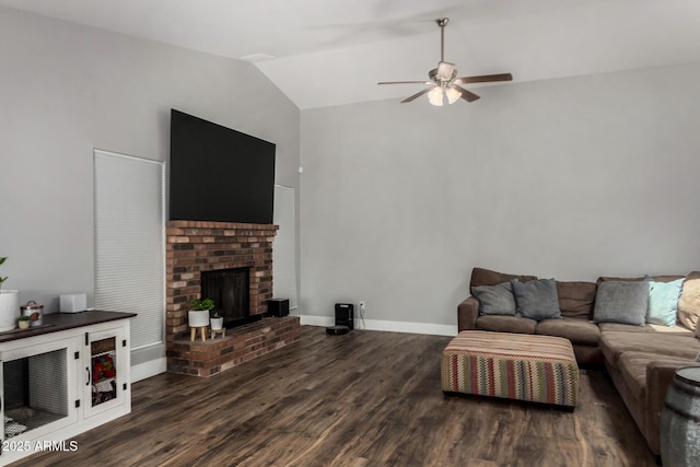 living room featuring high vaulted ceiling, a ceiling fan, a brick fireplace, and wood finished floors