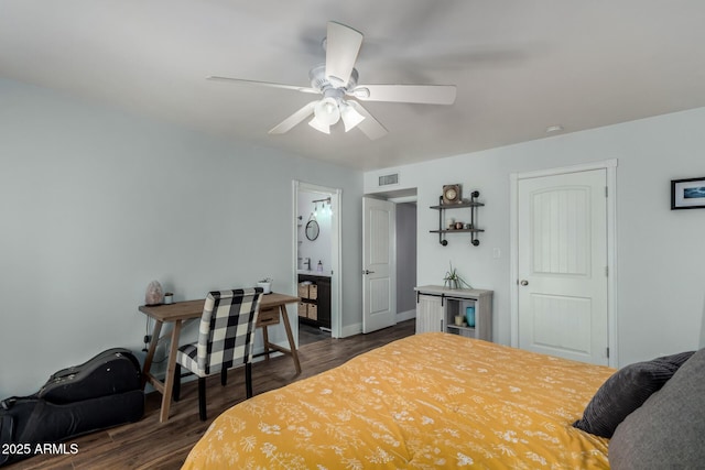 bedroom featuring baseboards, visible vents, ceiling fan, and dark wood finished floors