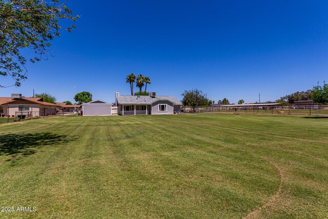 view of yard with fence