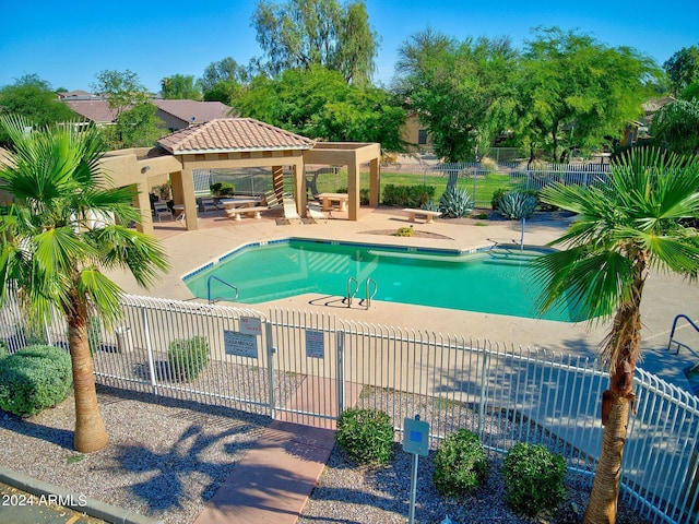 view of pool featuring a patio area