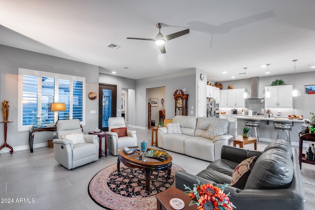 living room featuring ceiling fan