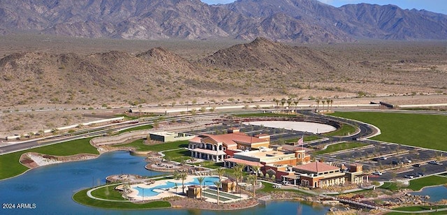 bird's eye view featuring a water and mountain view