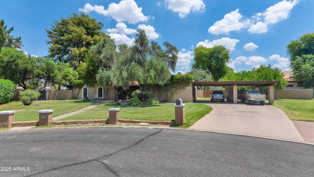 1298 E Buffalo St, Chandler, AZ 85225 - view of front of property with a carport, a front lawn, concrete driveway, and stucco siding