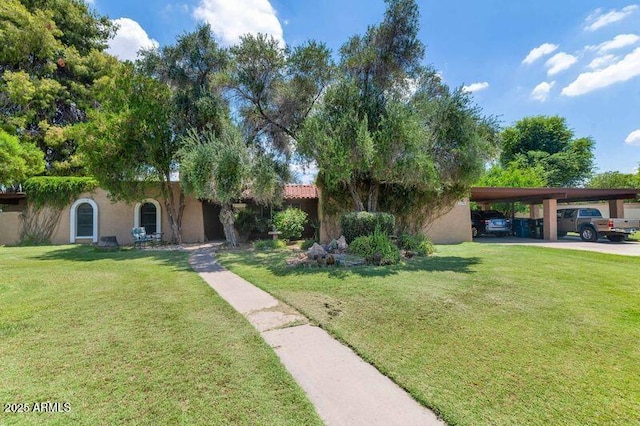 1298 E Buffalo St, Chandler, AZ 85225 - view of front of home featuring stucco siding, a front lawn, and an attached carport
