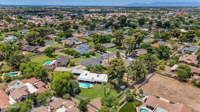 1298 E Buffalo St, Chandler, AZ 85225 - aerial overview of property's location featuring a pool area, nearby suburban area, and a mountain backdrop