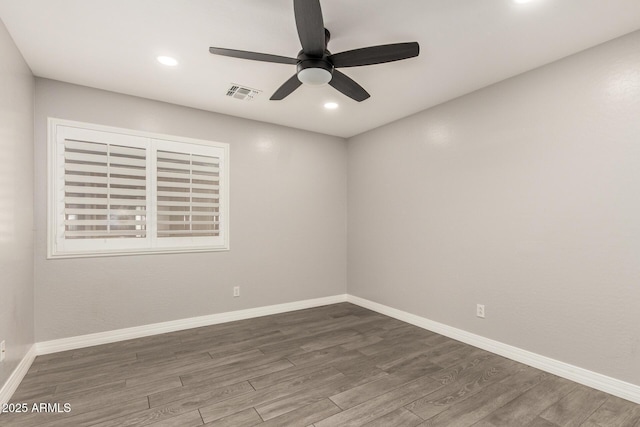 unfurnished room featuring ceiling fan, recessed lighting, wood finished floors, and visible vents