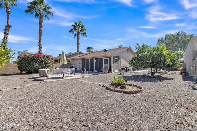 rear view of house featuring a patio area