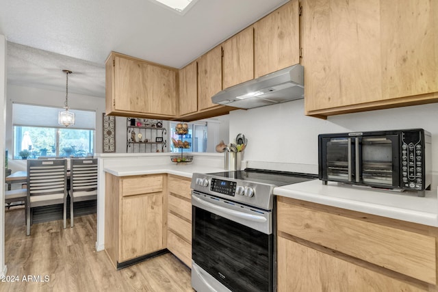 kitchen featuring light brown cabinets, decorative light fixtures, stainless steel electric range, and light wood-type flooring