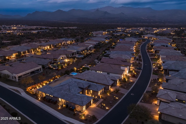 aerial view at dusk with a mountain view