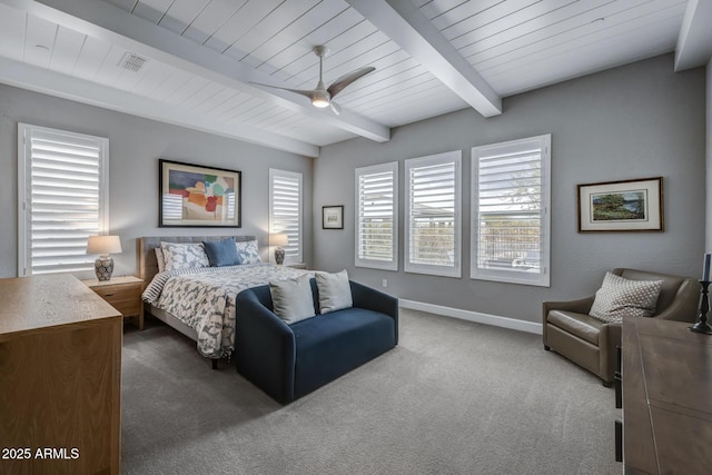 bedroom featuring wood ceiling, beam ceiling, ceiling fan, and carpet