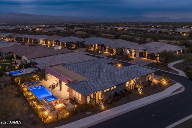 view of aerial view at dusk