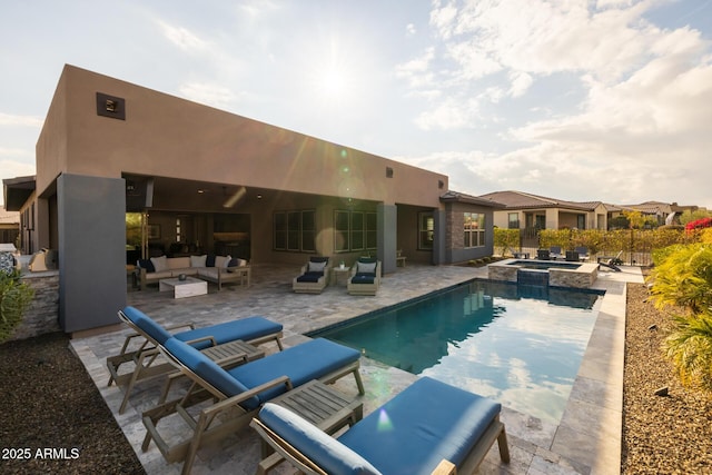 view of pool featuring an in ground hot tub, outdoor lounge area, and a patio