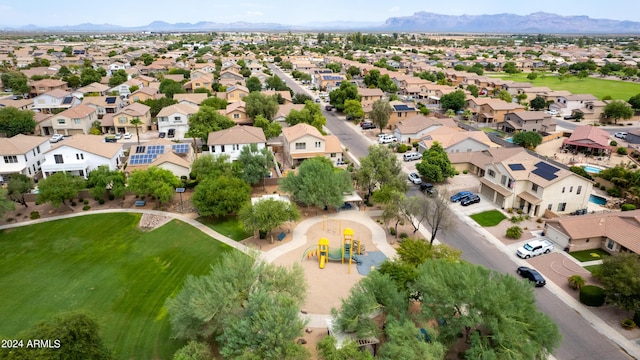 drone / aerial view with a residential view and a mountain view