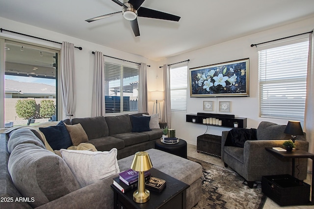 living room with a ceiling fan