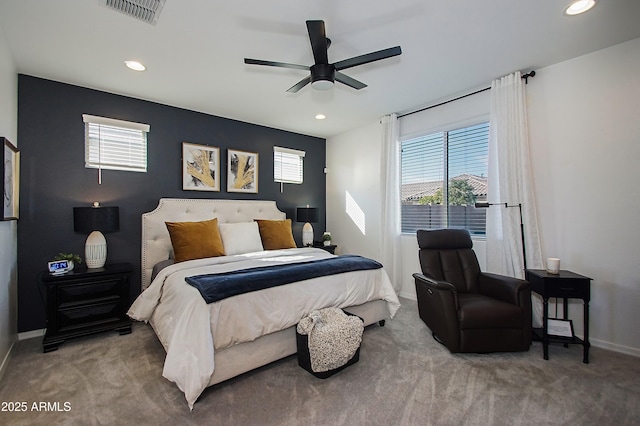 bedroom featuring baseboards, visible vents, and carpet flooring