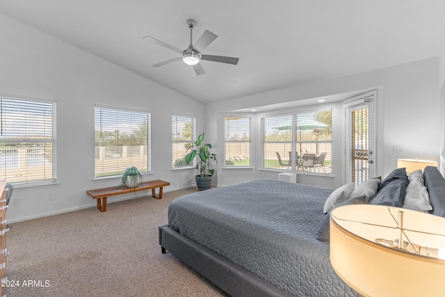 carpeted bedroom with lofted ceiling and ceiling fan