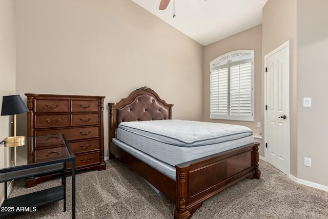 bedroom with carpet floors, vaulted ceiling, baseboards, and ceiling fan