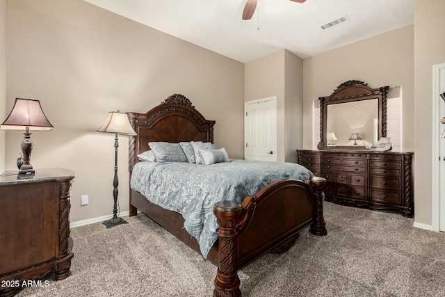 carpeted bedroom with visible vents, ceiling fan, and baseboards