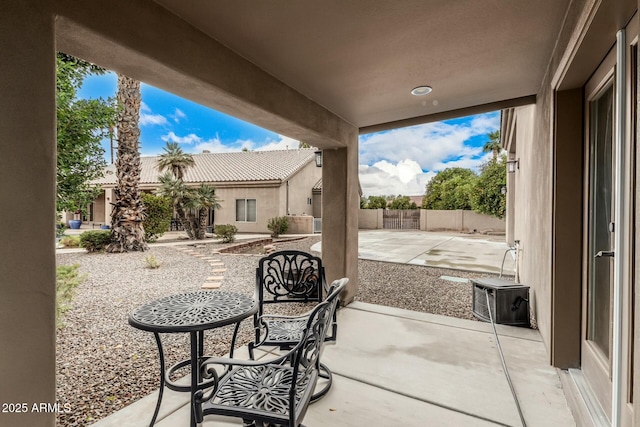 view of patio with fence