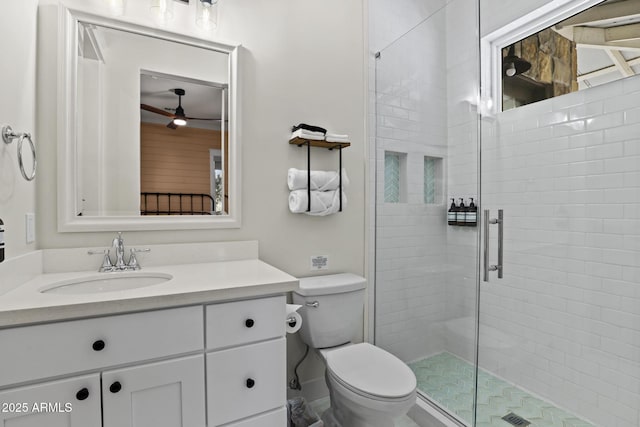 full bath with toilet, a stall shower, and vanity