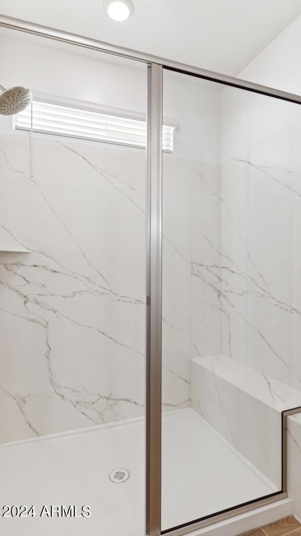 7384 W Buckhorn Trl, Peoria, AZ 85383 - bathroom featuring a marble finish shower