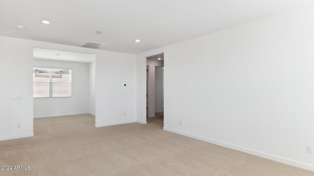 7384 W Buckhorn Trl, Peoria, AZ 85383 - spare room with recessed lighting, light carpet, and baseboards