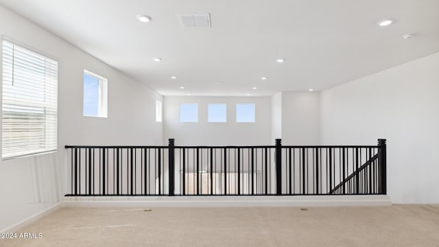 7384 W Buckhorn Trl, Peoria, AZ 85383 - empty room with plenty of natural light, carpet floors, recessed lighting, and a smoke detector