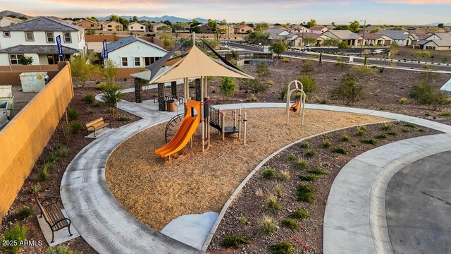 7384 W Buckhorn Trl, Peoria, AZ 85383 - community jungle gym featuring a residential view