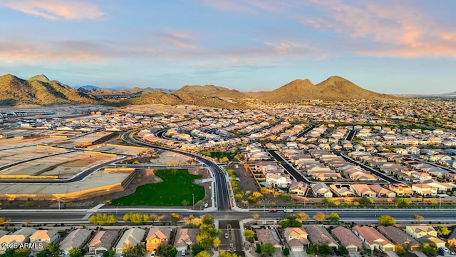 7384 W Buckhorn Trl, Peoria, AZ 85383 - aerial view of property's location with nearby suburban area and mountains