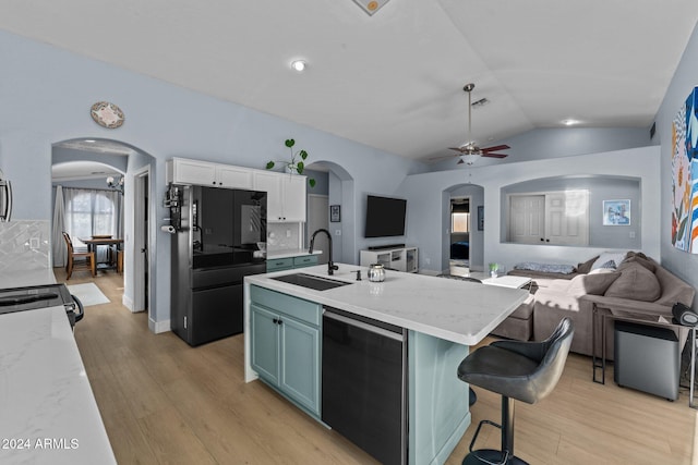 15912 W Central St, Surprise, AZ 85374 - kitchen featuring black appliances, arched walkways, a sink, open floor plan, and ceiling fan