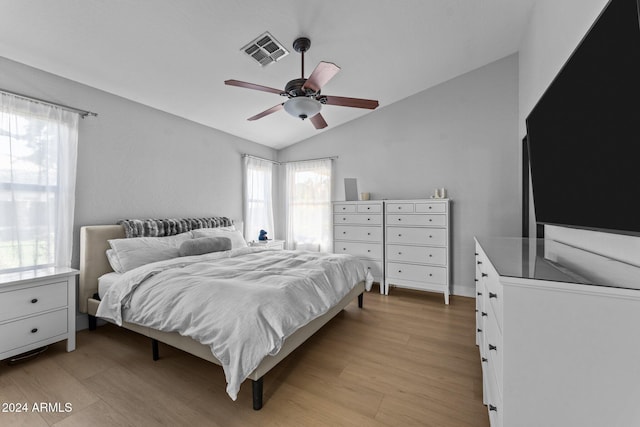 15912 W Central St, Surprise, AZ 85374 - bedroom with vaulted ceiling, light wood-type flooring, and a ceiling fan
