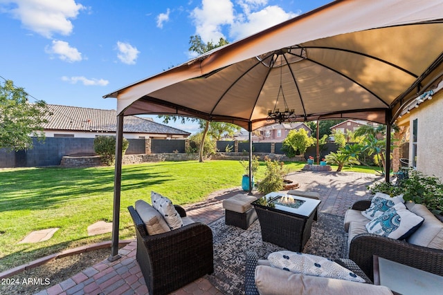 15912 W Central St, Surprise, AZ 85374 - view of patio / terrace with a gazebo and an outdoor living space with a fire pit
