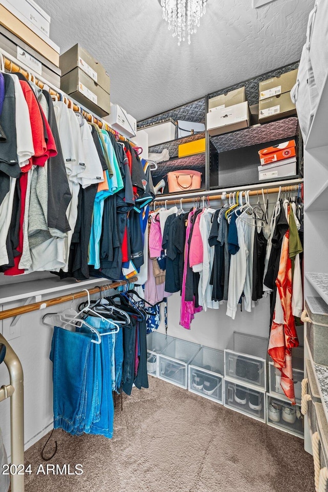 15912 W Central St, Surprise, AZ 85374 - spacious closet featuring carpet flooring and a chandelier