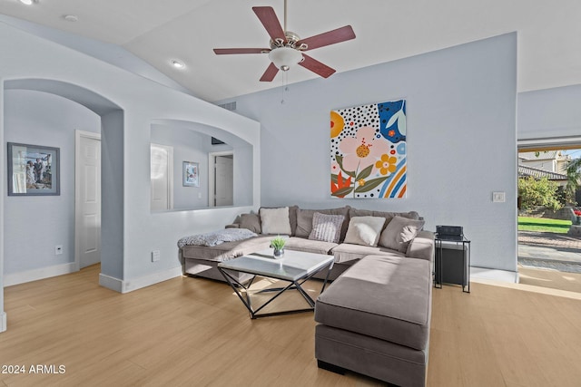 15912 W Central St, Surprise, AZ 85374 - living room with wood finished floors, a ceiling fan, lofted ceiling, arched walkways, and baseboards