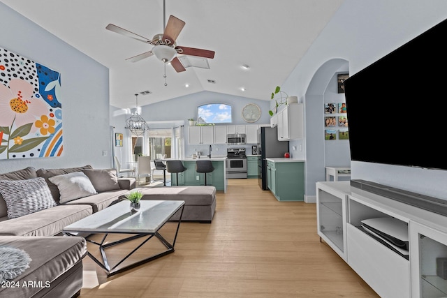 15912 W Central St, Surprise, AZ 85374 - living room featuring ceiling fan, vaulted ceiling, arched walkways, light wood-type flooring, and recessed lighting