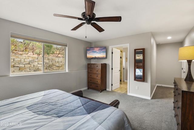 carpeted bedroom featuring recessed lighting, ceiling fan, and baseboards